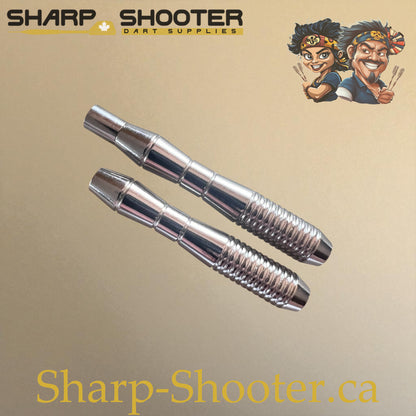 Silver dart barrels – one standard, one with weight adjuster installed – Sharp-Shooter