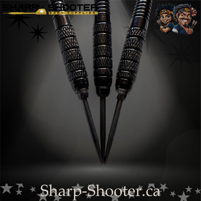 Aftershock-S steel tip dart set with SD12 black barrels, 29 mm slim steel tips, blue shafts, and star-pattern flights – Sharp Shooter Dart Supplies.