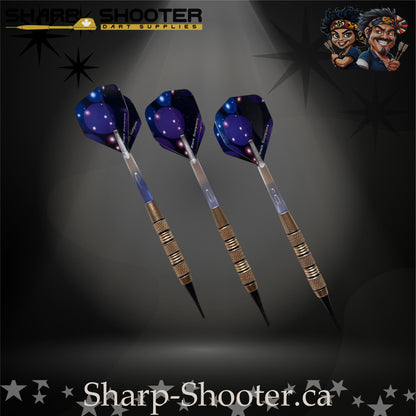 Blue Lagoon soft tip dart set featuring silver-nickel SD08 Night Forge barrels with black accent rings, clear shafts with visible air-bubble cores, and matching blue flights, displayed on a dark gradient background.