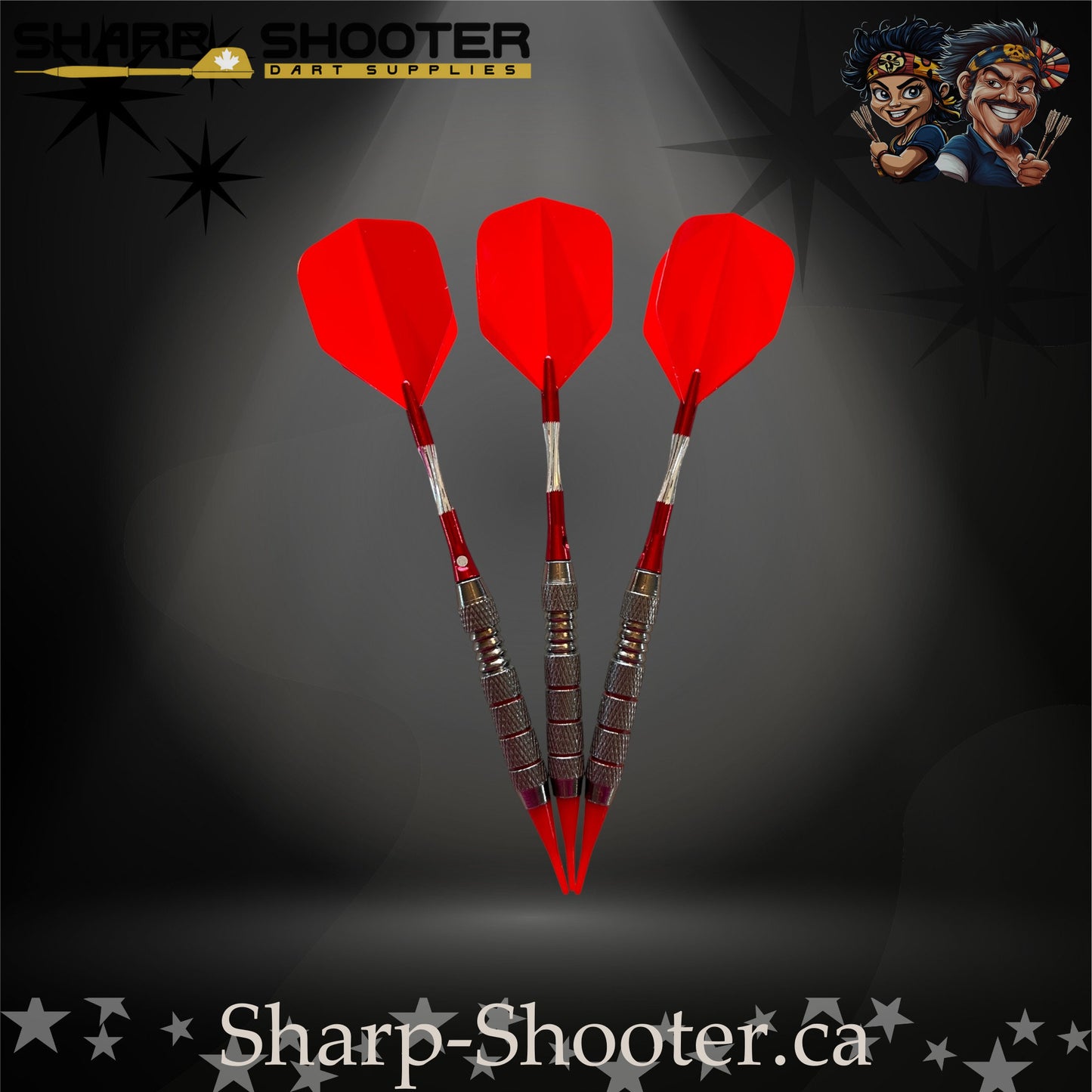 Cherry Bomb soft-tip dart set with red flights, red shafts, and a ringed metallic barrel on a dark spotlight background