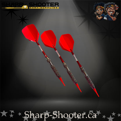 Cherry Bomb soft-tip dart set with red flights, red shafts, and a ringed metallic barrel on a dark spotlight background