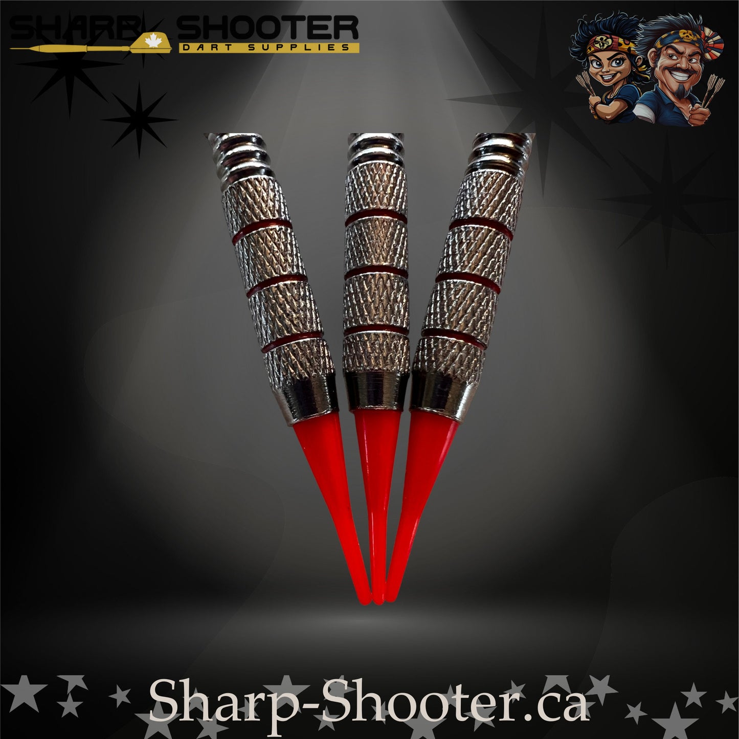 Cherry Bomb soft-tip dart set with red flights, red shafts, and a ringed metallic barrel on a dark spotlight background