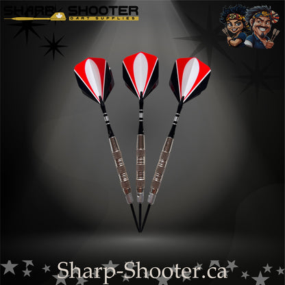 Echelon soft tip dart set with silver SD05 Gauntlet barrels, deep ring grip pattern, engraved aluminum shafts with O-rings, black/red/white flights, displayed on a dark spotlight background.