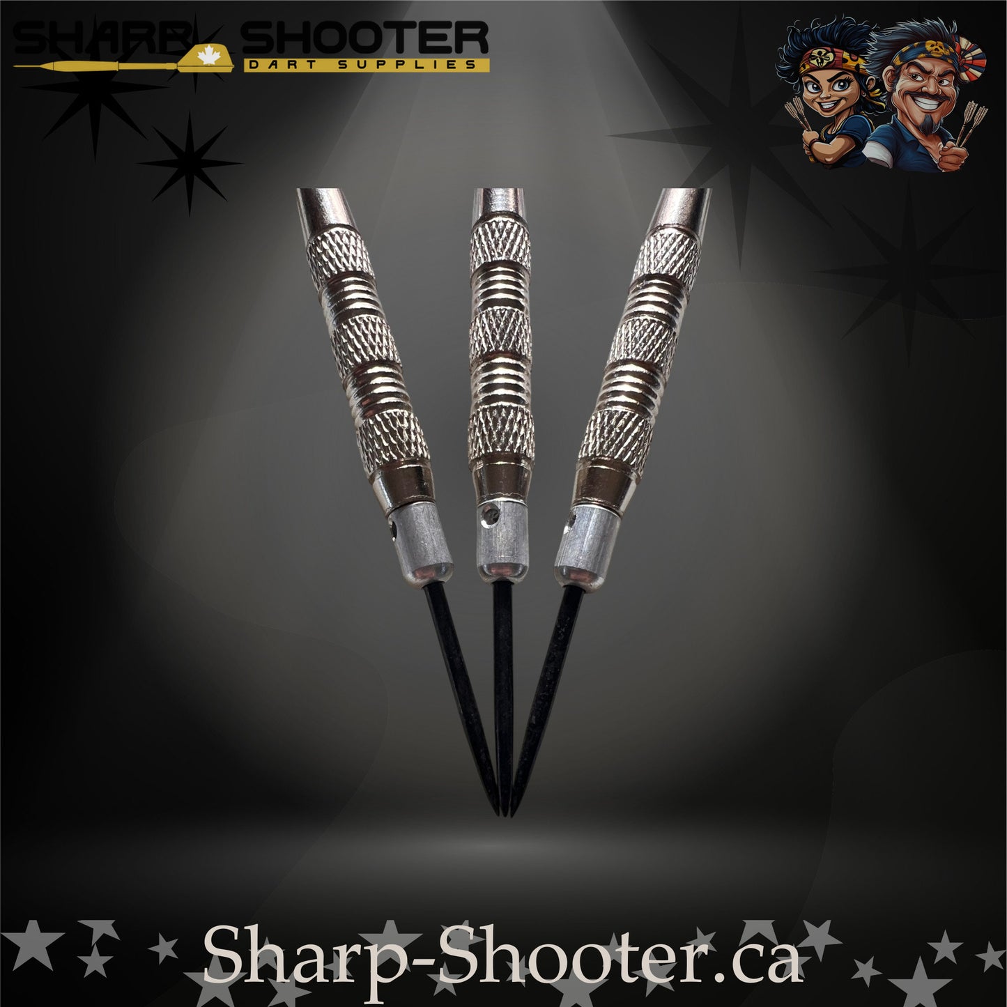 Echelon soft tip dart set with silver SD05 Gauntlet barrels, deep ring grip pattern, engraved aluminum shafts with O-rings, black/red/white flights, displayed on a dark spotlight background.