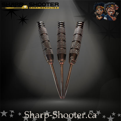 London Fog steel tip dart set featuring silver-grey patterned flights, black shafts, and precision-cut ringed barrels on a dark spotlight background.