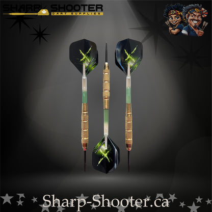 Sniper steel-tip dart set with gold knurled barrels, green-gradient shafts and green energy burst flights on a dark spotlight background.