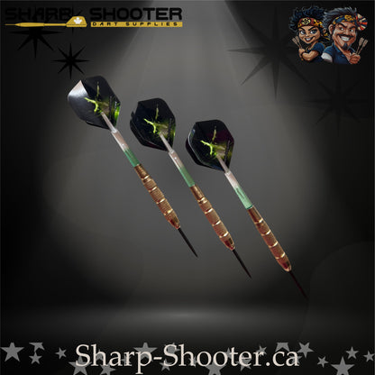 Sniper steel-tip dart set with gold knurled barrels, green-gradient shafts and green energy burst flights on a dark spotlight background.