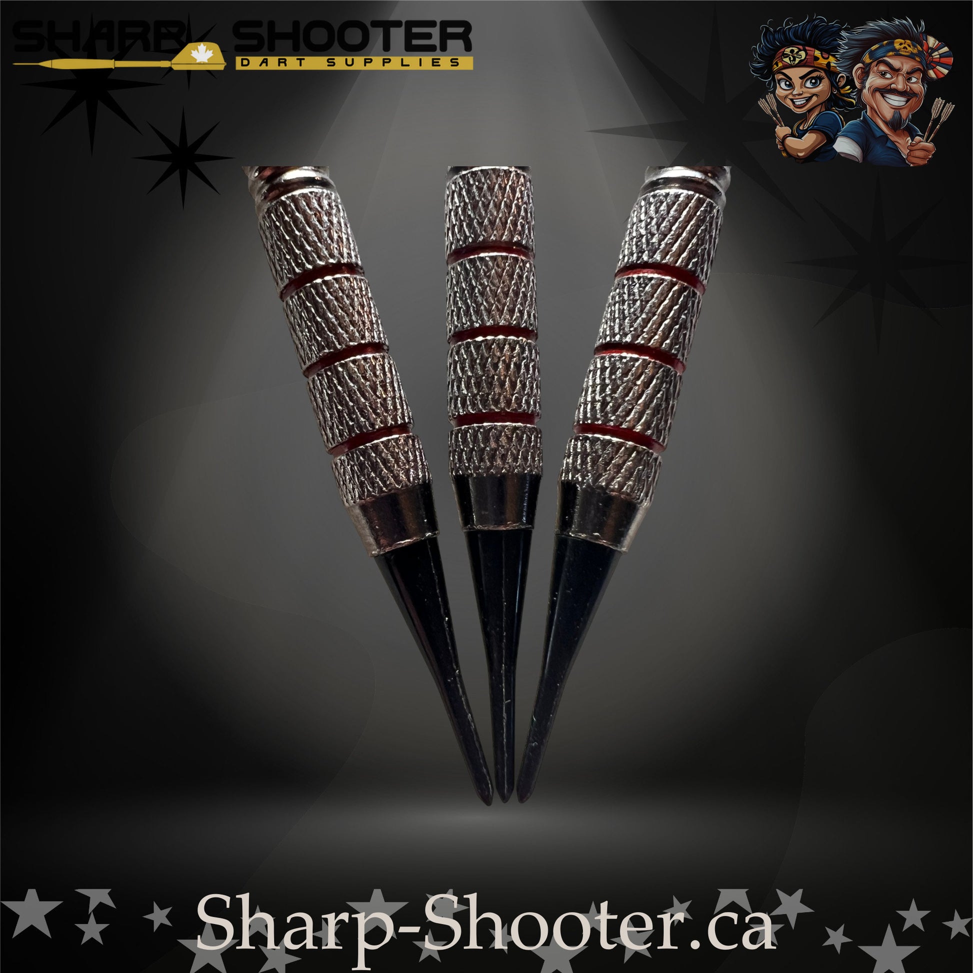 Sunset soft-tip dart set featuring red gradient flights, red shafts, silver ringed barrels, and black soft tips on a dark spotlight background.