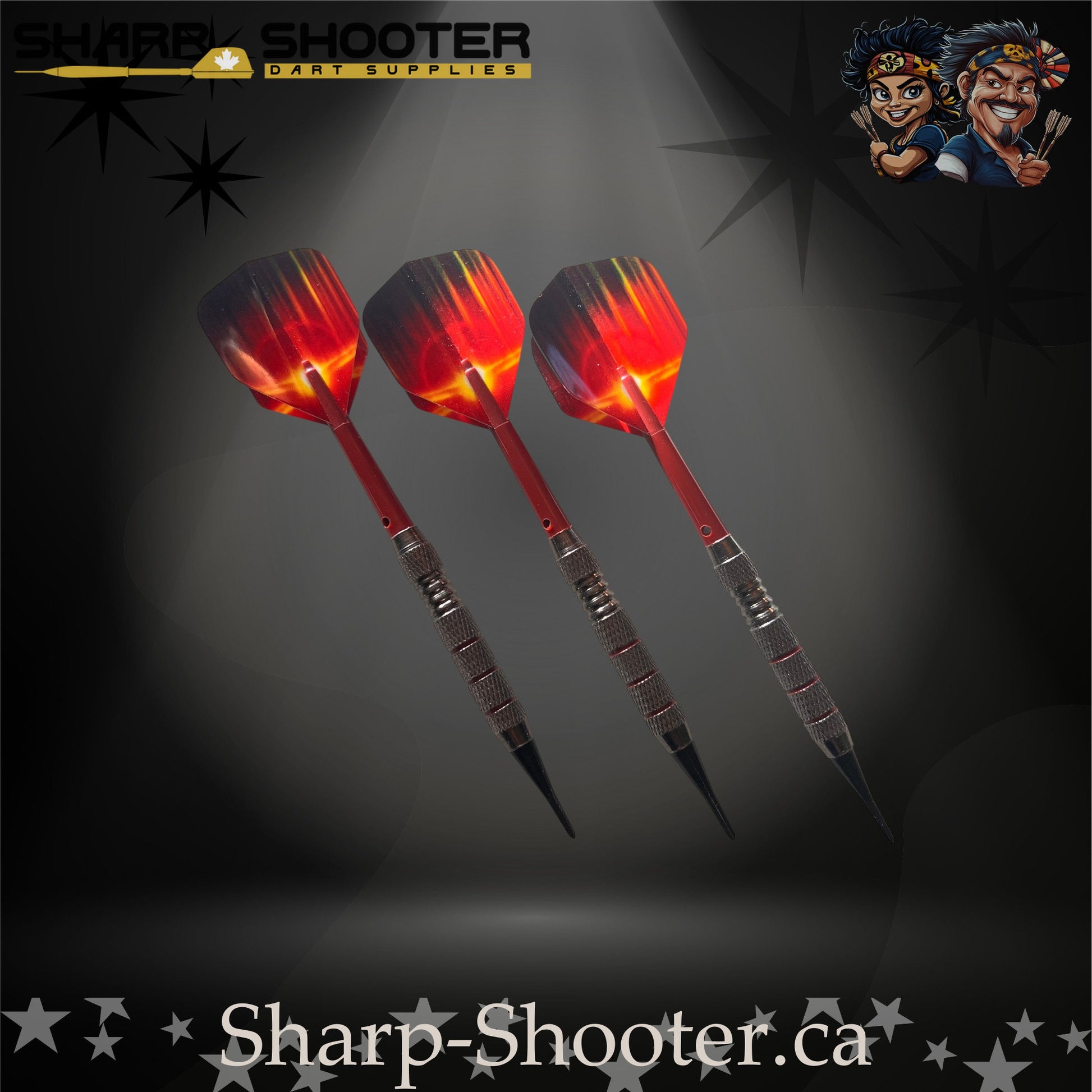 Sunset soft-tip dart set featuring red gradient flights, red shafts, silver ringed barrels, and black soft tips on a dark spotlight background.